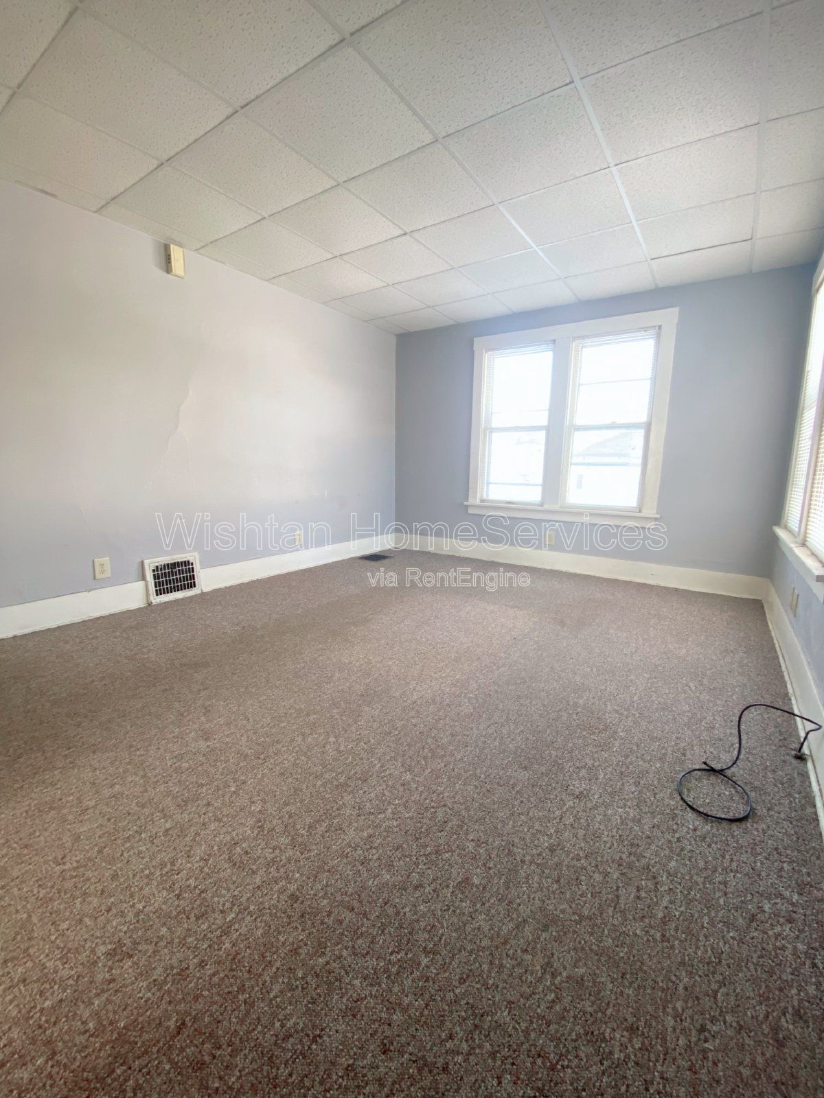 One-Bedroom Retreat on a Quiet Street: Affordable Living with On-Site Laundry. Budget-Friendly Comfort in a Tranquil Setting. property image